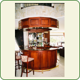 Tailor made solid raised and fielded panel mahogany bar