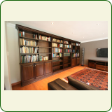 Veneer Mahogany bookcase with solid raised and fielded panel mahogany doors 