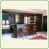 Semi solid Mahogany bar with built in cellar and LCD TV